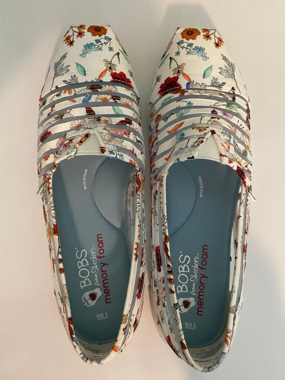 Skechers BOBS Women's Floral Slip-On Shoes in White with Multi-Colored Accents